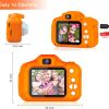 Оранжев детски фотоапарат STELS FunShot W390 с включени аксесоари и дисплей, показващ снимка.